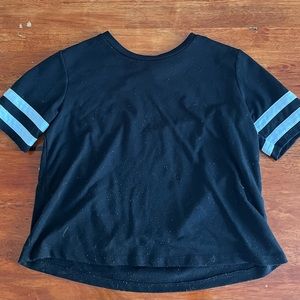 ‘Inspired Hearts’ black crop top with white stripes.